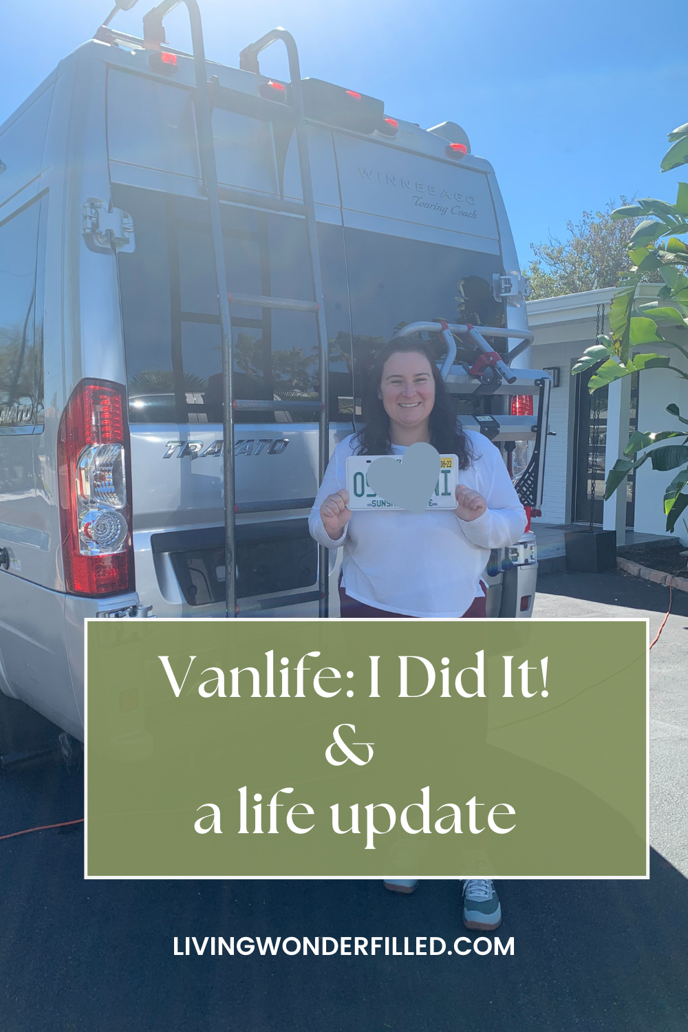 kristina standing in front of the back doors of her new van